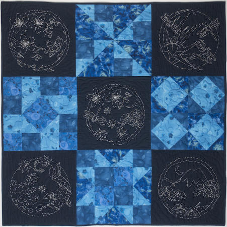 Four Seasons Sashiko patterns
on solid dark blue fabric are printed in solid lines for the intermediate to advance stitcher who have an understanding of the running stitch. Sashiko stitching lines are removed using steam from your iron after you finish. Kit for quilt is sold out, but you can order the 5 printed Sashiko patterns below