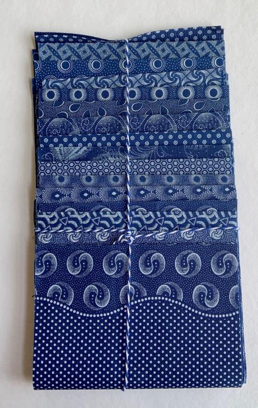Shweshwe indigo cotton fabrics from South Africa are included in this bundle of 15 different fabrics. 7 x 35 inches- 2 7/8 yards-  $45.00 Fabrics in kits are subject to change.