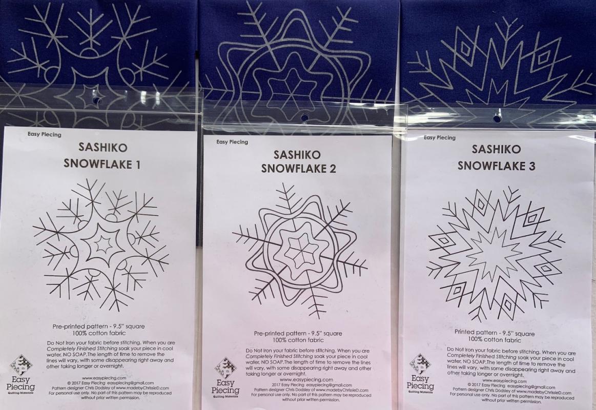 Three Sashiko Snowflake pre-printed patterns. One skein of thread needed. Not included. We have the thread. Pattern washes out. Each square is 9.5"  Set $23.95