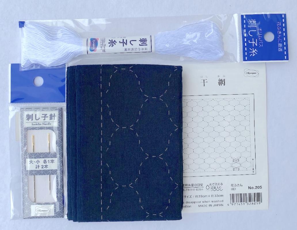 Navy Sashiko Sampler kit-Hoshi- Follow the pre-printed lines to complete. Pattern washes out and backing included to make it into a pillow. Finished size 12  $17.70 Includes sampler, thread and needle