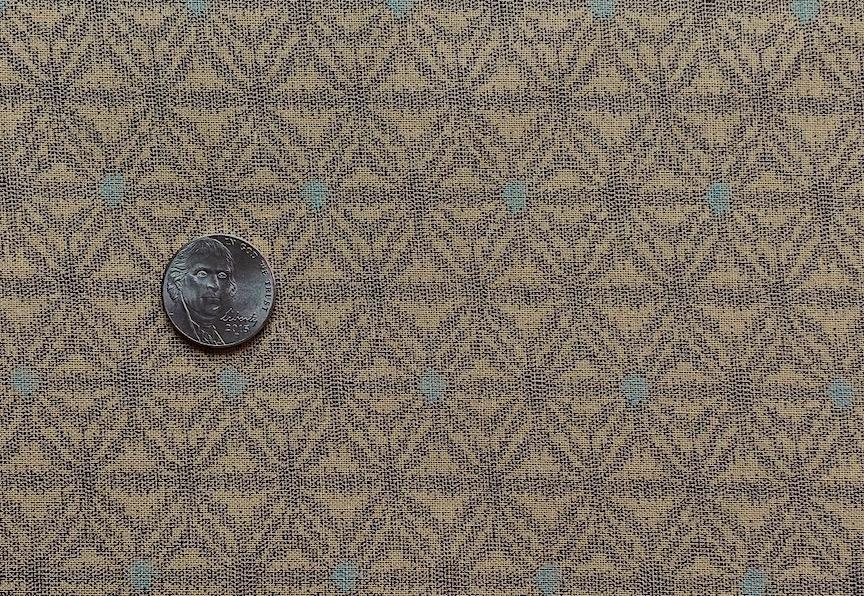 Traditional patten on tan background with black and light blue print - cotton  Sale $9.45 was $13.50 yd