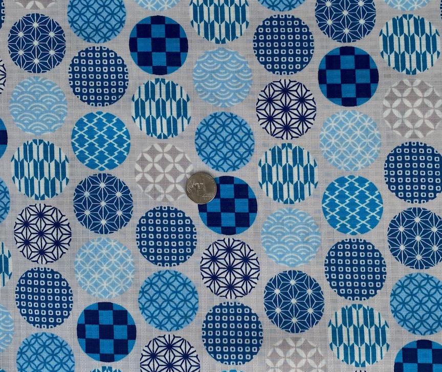 Blue circles on light gray background- lightweight cotton-  sale $12.60 yd-  was $15.75