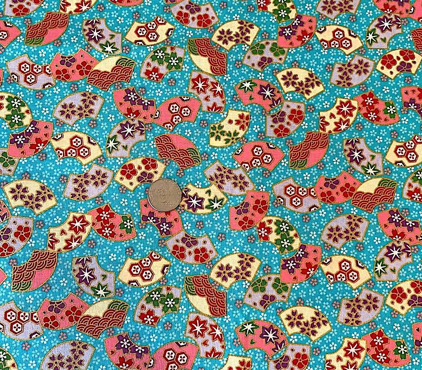 Fans on turquoise cotton- sale $10.40 yd-  was $13.00